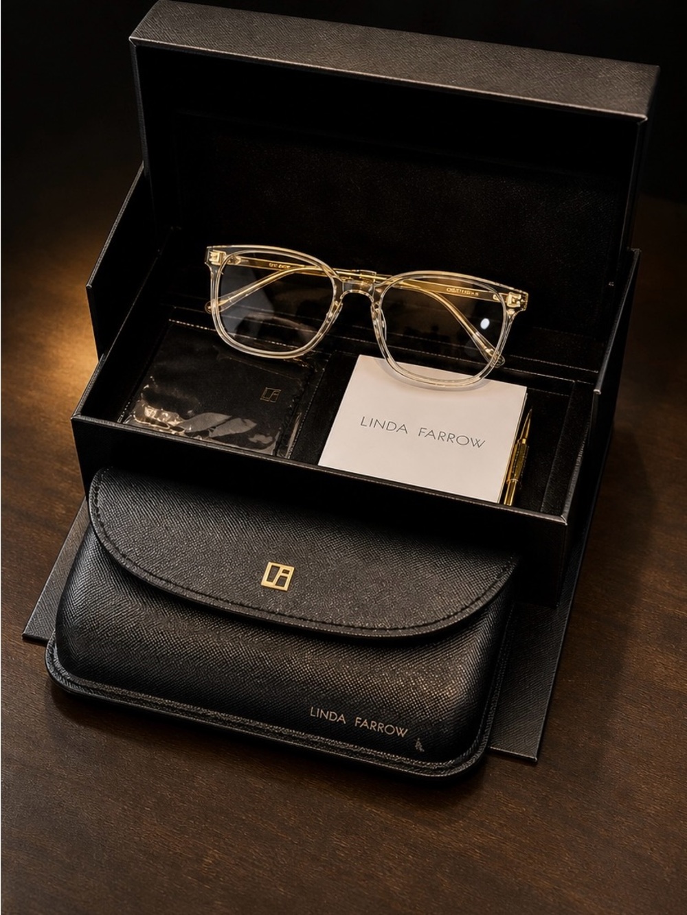 Linda Farrow Black Case with titanium Gold-Tone